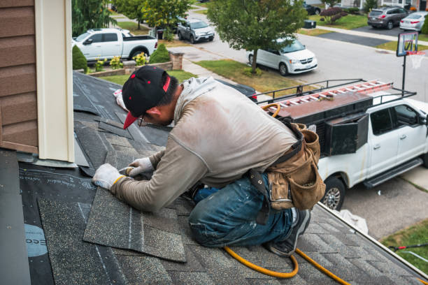 Professional Roofing technician working in Keller, WA